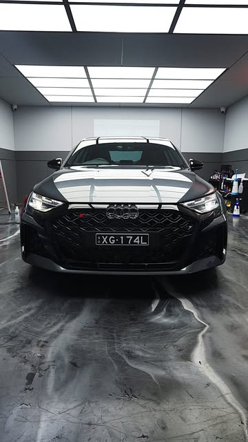 Grey Audi RS 3 photographed from the front inside the G’ZOX Adelaide studio